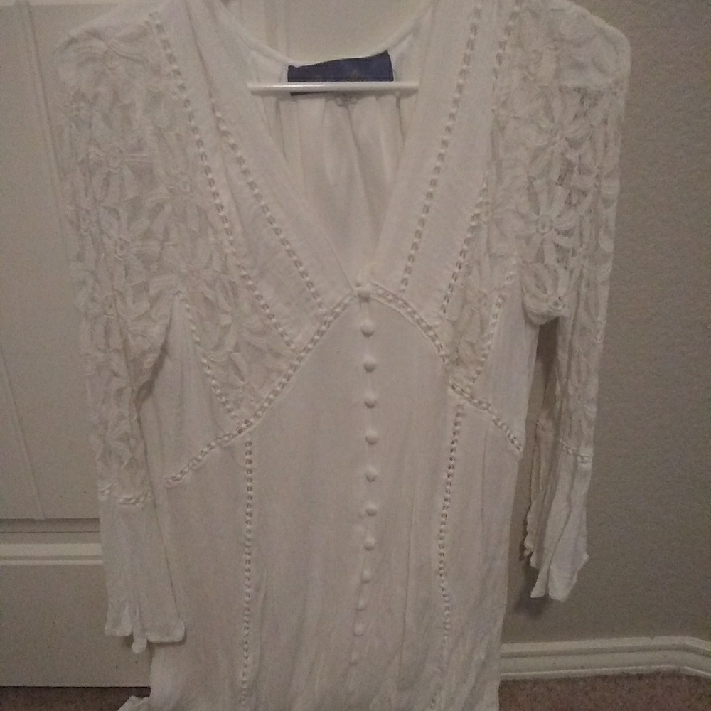 White knee length dress with button front